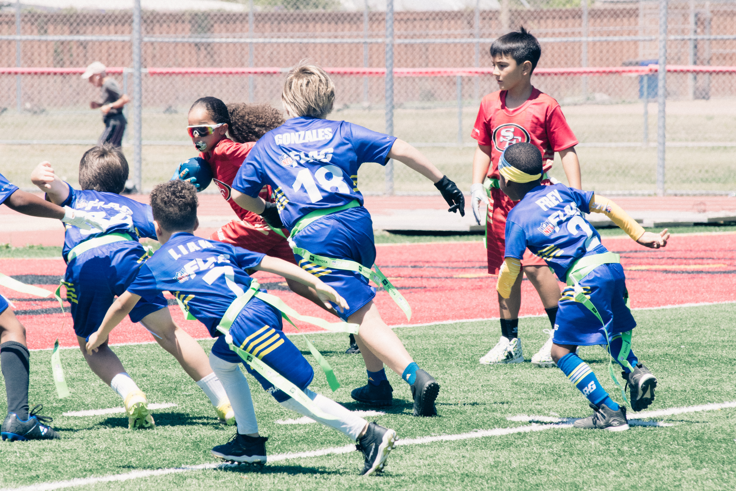 Rising Fire players enjoying flag football