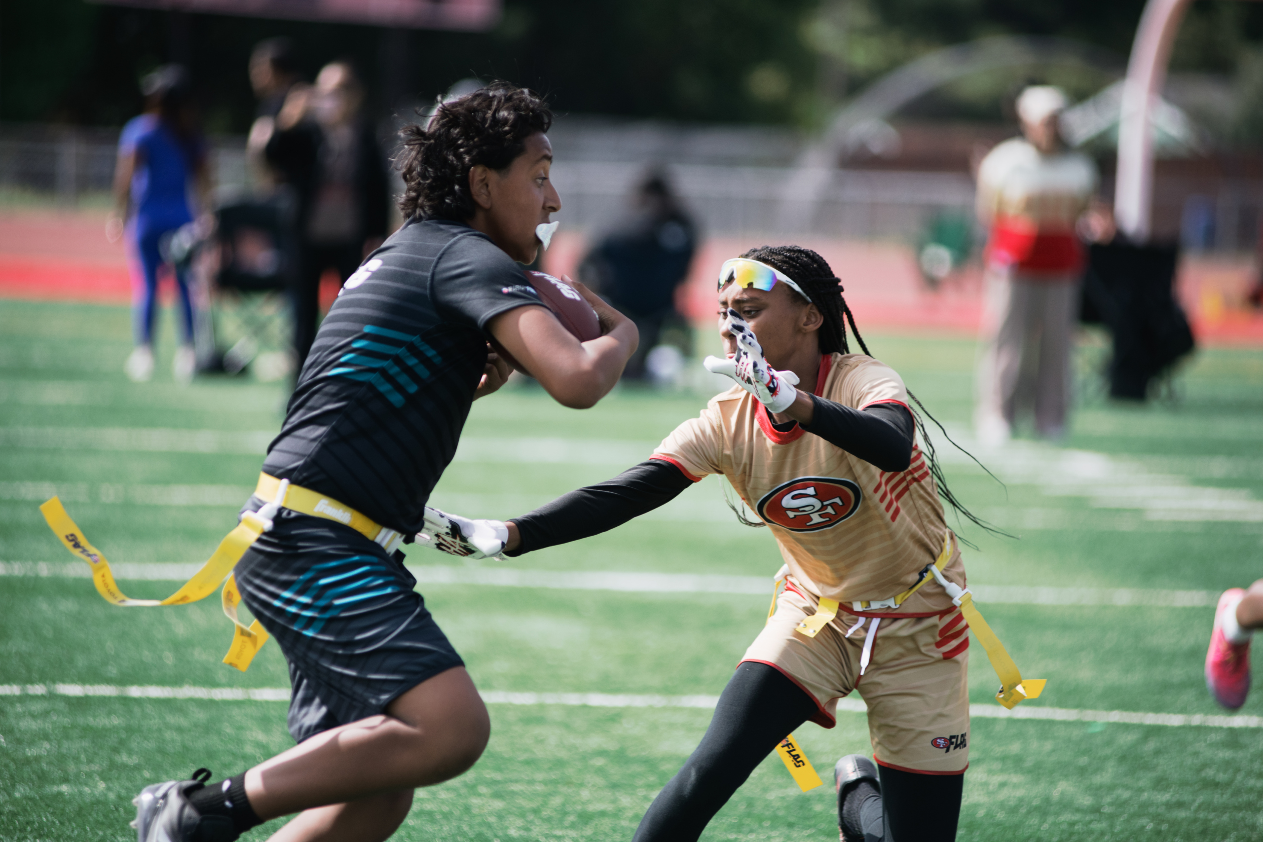 Rising Fire players enjoying flag football